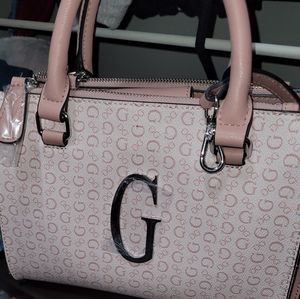 Guess crossbody. New with tags. Light rose color